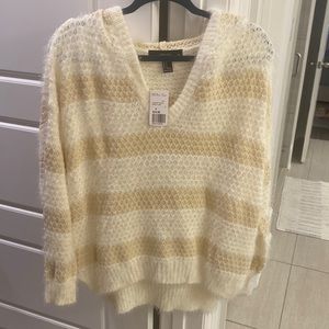 New, with tags. Size small